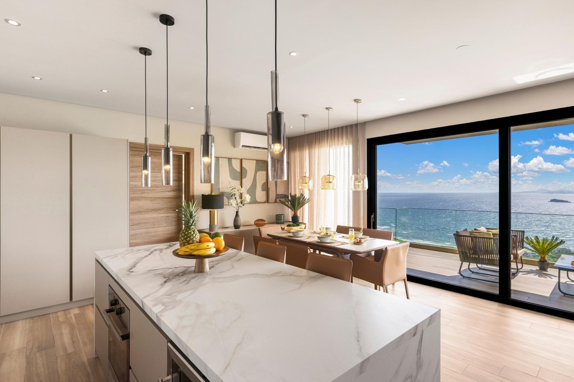 Contemporary Ocean‑View Apartment with Marble‑Veined Waterfall Island & Panoramic Glass Terrace